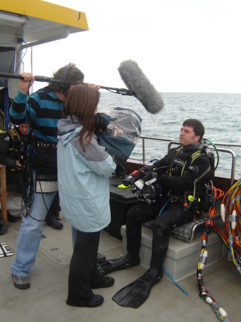 Diver being interviewed after a dive